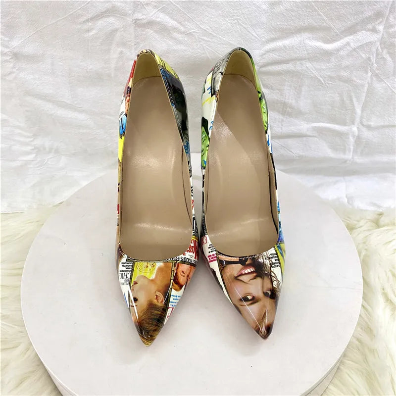 Magazine-print patent leather stiletto pumps